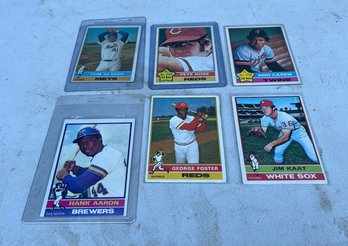 Six Vintage Baseball Cards With Tom Seaver, Peter Rose, Rod Carew, Hank Aaron, George Foster, And Jim Kaat