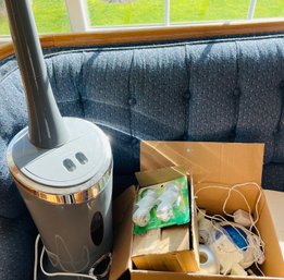 Air Filtering System And 2 Boxes Of Various Air Freshners, Refills And Oils