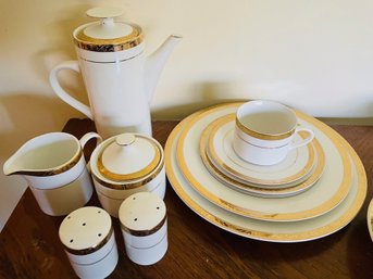 Beautiful Gold Rimmed China Set.  8 PLacesettings, Platter And Bowl.  Like New!