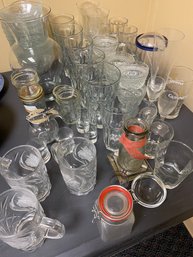 Large Assortment Of Glasses (glass And Crystal) And Stack Of Glass Salad Bowls