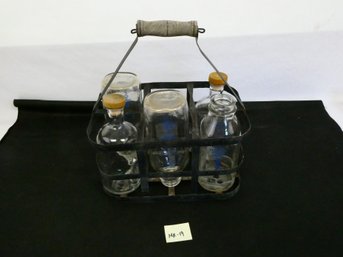 Milk Bottle Caddy With An Assortment Of Milk (and Other) Bottles