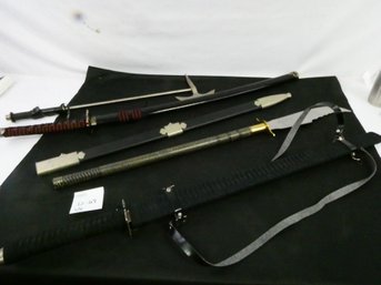 Lot Of 4 Ornamental And Decorative Weapons W/ An Extra Empty Sheath.