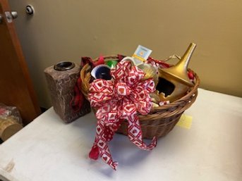 Basket With A Lot Of Candles And Candle Accessories