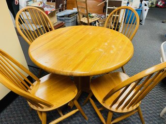 Solid Oak Round Table (about 42') With 4 Matching Chairs.