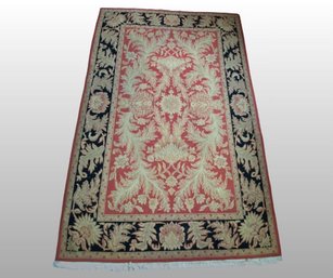 Hand Knotted Wool Rug With Foliate Design In Black And Salmon