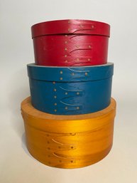 Three Decorative Round Storage Boxes