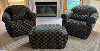 Pair Of Upholstered Arm Chairs On Swivel Base With Matching Ottoman