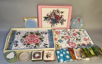 A Hostess Collection Of Floral Trays, Placemats, Needlepoint Casters, Porcelain Coasters And Paper Goods