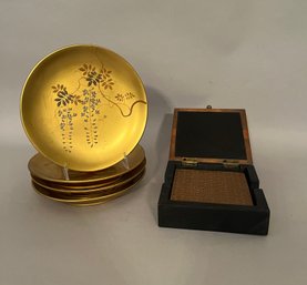 Lacquered Japanese Wood Plates Together With A Box Of Embossed Copper Coasters