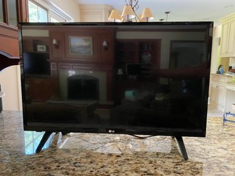 27 LG Flat Screen TV On Stand
