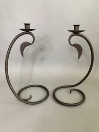 Pair Of Candle Stick Holders With A Round Spiral Bottom