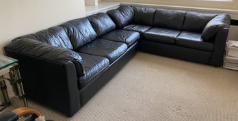 Two-Piece Black Faux Leather Sectional Sofa Bed