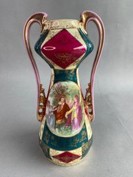Double Handled Urn With Portrait Decoration