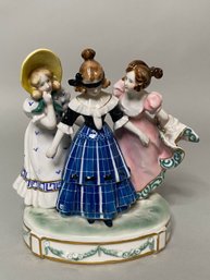 Karl Ens For Volkstadt Porcelain Figural Group: Three Young Ladies Playing Blind Mans Bluff,  1919-1945