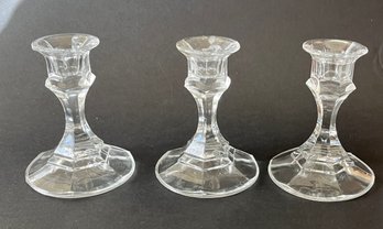 Three Glass Candlesticks With A Modern Lusterware Votive