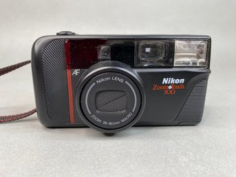 Nikon Zoom Touch 500 And Pocket Instamatic 40 Cameras