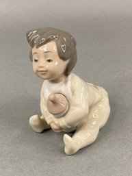 Lladro NAO Baby With Bottle Figurine