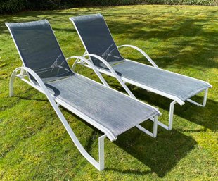 Two Outdoor Sling Lounge Chairs