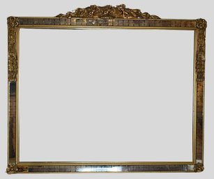 Antique Gilt Carved Cupid Mirror With Flower And Tassel Decoration