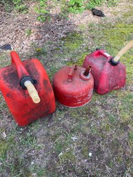 Three Gas Cans - One Metal Two Plastic