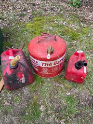 Three Gas Cans - One Metal Two Plastic