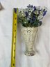 Wrought Iron Vase With Small Floral Arrangement