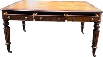 19th Century English Tooled Leather Top Partners Desk On Casters