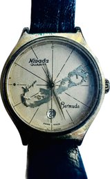 Nivada Quartz Watch With Bermuda Outline Gold Tone Face - Signed 'Nivado Baby Whale - Swiss Made'