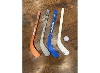 Four Mini Hockey Sticks