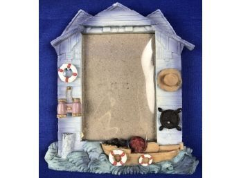 Resin Frame - Boathouse With Dory, Straw Hat, Binoculars, Life Bouys, Captain's Wheel, & Splashing Waves