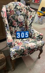 Queen Anne Style Wing Chair With Fan Carved Knees And Floral Upholstery