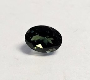 MOLDAVITE!!  Faceted Oval Loose Stone Made From A METEORITE IMPACT!!  .94 Ct Tw