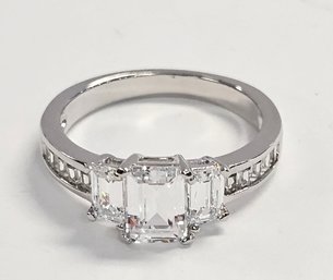 NEW!!!  Sterling Silver ENGAGEMENT RING W/ EMERALD CUT CZ's!!!  DOUBLE PRONGS!!!  SIZE 7!!