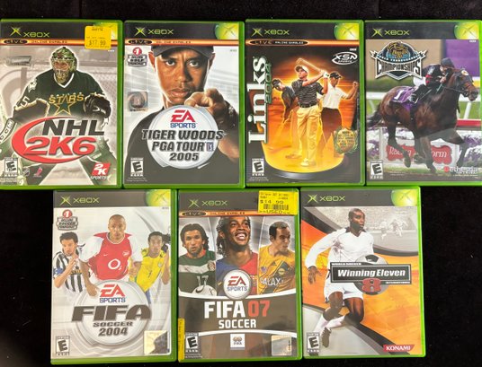 (D-7) COLLECTION OF SEVEN XBOX SPORTS GAMES IN CASES - FIFA, LNKS, HORSE RACING