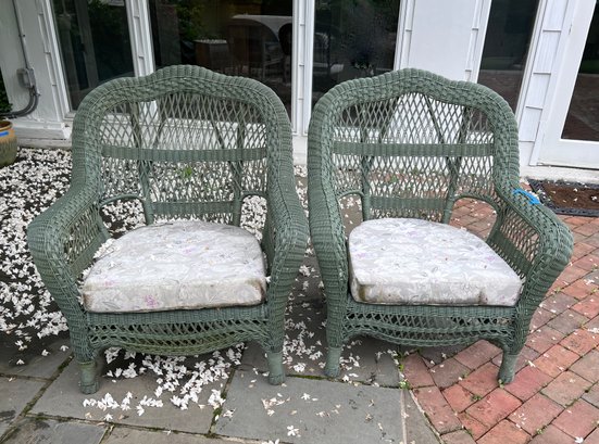 PAIR OF SAGE GREEN VINYL WICKER PATIO ARMCHAIRS - 38' BY 35' BY 24'