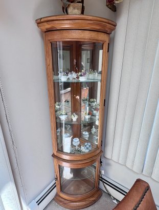 (DEN) CORNER OAK TWO PIECE CURIO CABINET WITH GLASS FRONT - MISSING HANDLE TO OPEN - CONTENTS INCLUDED - 68' B