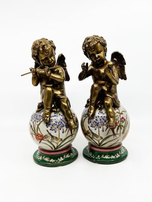(A10) PAIR OF DECORATIVE ANGELS SITTING ON PORCELAIN BASES - EACH MEASURES APPROX. 9 1/2' TALL