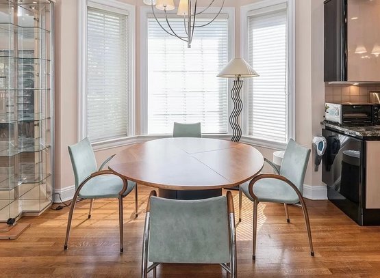 BERNINI ITALIAN EXPANDABLE ROUND DINING TABLE WITH HIDDEN LEAVES IN BASE - SIX ITALIAN CHROME CHAIRS INCLUDED