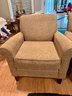 PAIR OF TAN UPHOLSTERED ARM CHAIRS - SOME WEAR TO PIPING, SEE PICS - 34' H BY 34' W BY 32' DEEP