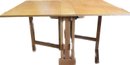 (F-13) VINTAGE FOLDING COMPACT DINING TABLE - CLOSES TO FORM CONSOLE TABLE OR TO BE STORED -36'BY 9' CLOSED,