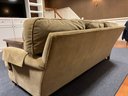 (BASE) SAGE GREEN UPHOLSTERED SOFA - GREAT CONDITION - 89' LONG BY 43' DEEP - LOCATED IN BASEMENT