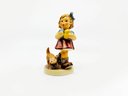 (U-85) PAIR OF HUMMEL FIGURINES IN ORIGINAL BOXES -'LITTLE KNITTER & LUCKY CHARMER' - 7.5' BY 4.5'