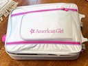 (A47) LOADED AMERICAN GIRL ZIPPERED SUITCASE FILLED WITH DOLL CLOTHES, ACCESSORIES & SHOES