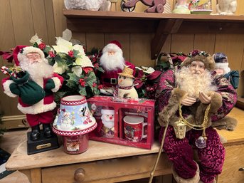 (B) NINE PIECE COLLECTION OF CHRISTMAS DECORATIONS - CANDLE, SANTAS, MUG, POINSETTIA  - 3'-14'