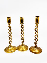 (A-12) TRIO OF VINTAGE TWISTED STEM BRASS CANDLE HOLDERS / STICKS - 11' TALL