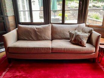 CONTEMPORARY SOFA WITH TAN SLIP COVERED, WASHABLE CUSHIONS - 88' BY 42' BY 20' SEAT HEIGHT