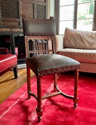 (S) ANTIQUE FRENCH HENRY II STYLE CARVED SPINDLE BACK, TOOLED LEATHER ACCENT CHAIR WITH MEDALLION HEAD DETAIL