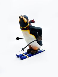 (B-32) CARLA ALBERT NUMBERED CARVED SCULPTURE PENGUIN SKIING-NUMBERED 41/150 APPROX. 10 1/2' X 10'