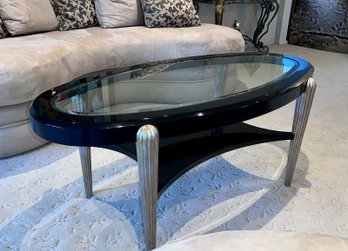 (LR) VINTAGE 1990'S OVAL POST MODERN COFFEE TABLE WITH GLASS TOP, HIGH GLOSS BLACK FINISH & SILVER TONE LEGS
