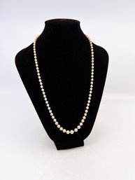 (J-7) VINTAGE 22' LONG GRADUATED CULTURED PEARLS WITH 10 KT GOLD CLASP